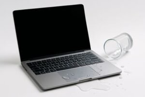 Water spilled on MacBook Air keyboard from glass - liquid damage Mac repair Los Angeles