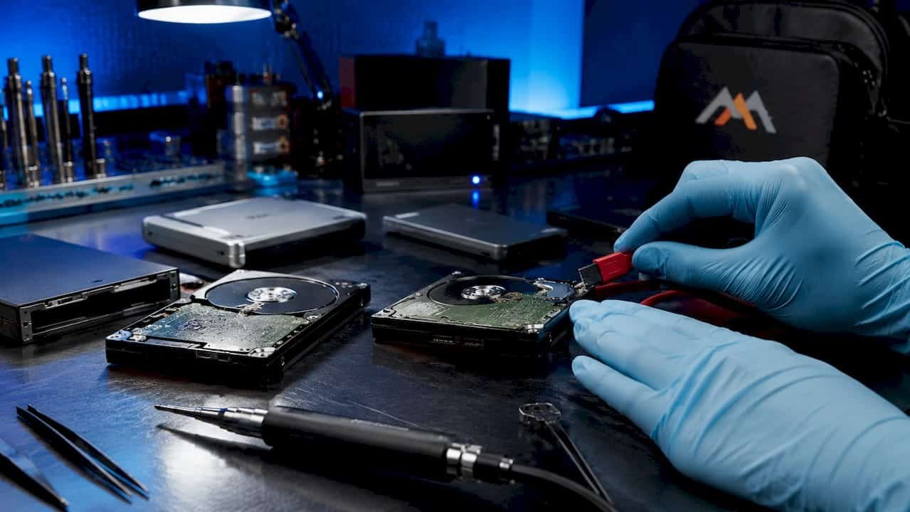 Hard Drive Data Recovery Services 3 Close-up of external hard drives and repair tools