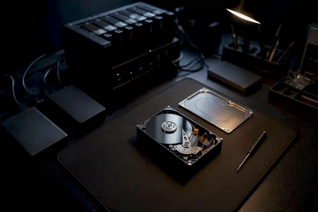 Close-up of external hard drives and data recovery tools