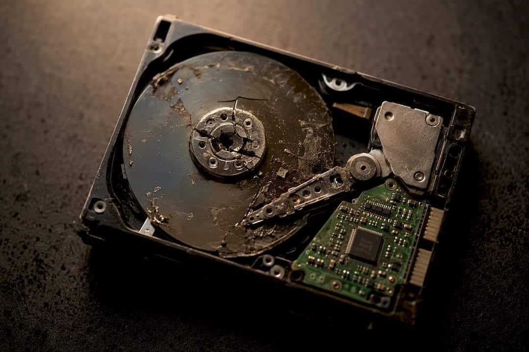 Stop Disk Writes First: Technician Steps When a Mac Pro Won't Boot 3 Opened external hard drive with damaged components