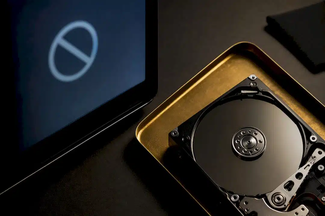 Hard drive beside prohibitory boot symbol