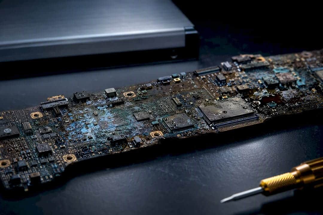Corroded circuit board beside recovery drive