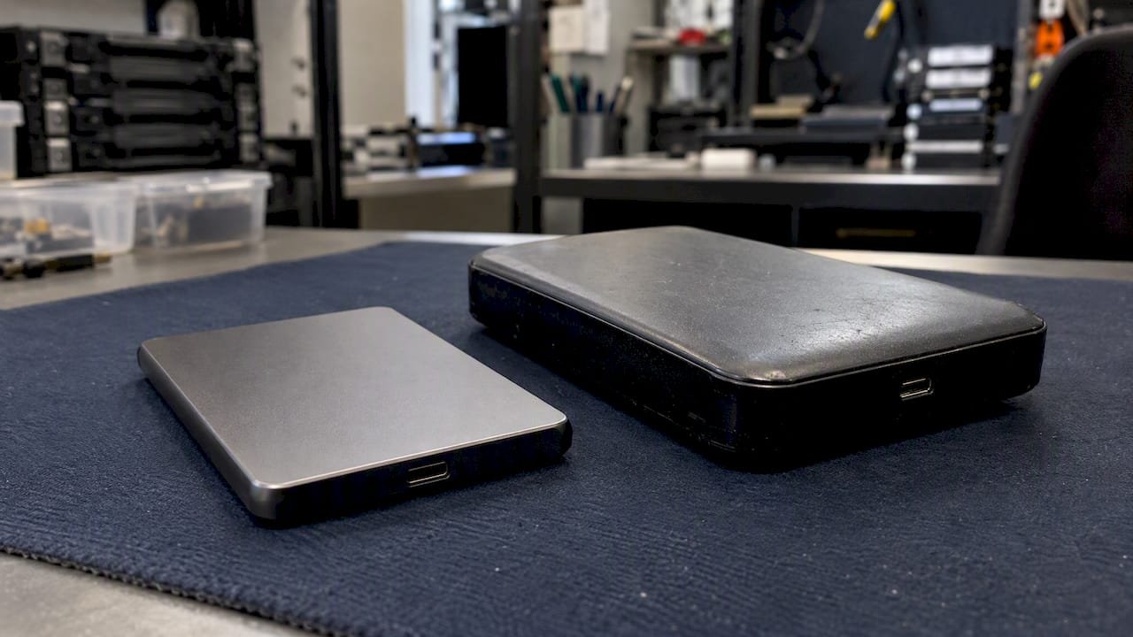 1792296621093_External-SSD-and-hard-drive-side-by-side External SSD and hard drive side by side